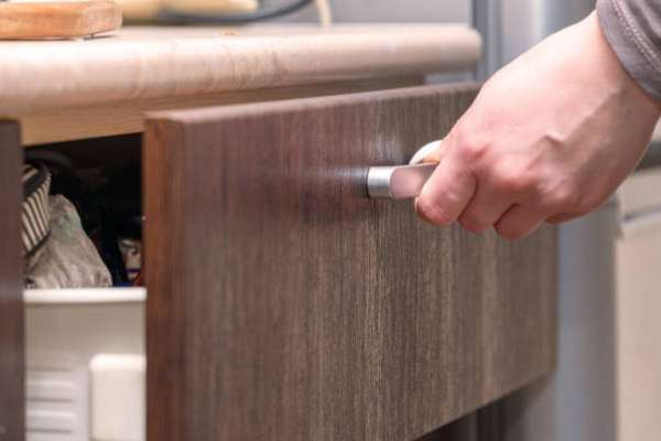 Detach Any Drawer Knobs Or Pulls